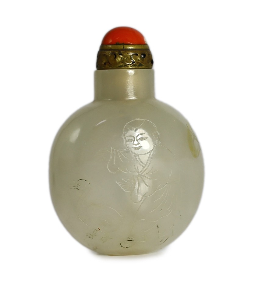 A Chinese agate ‘boys’ snuff bottle, 19th century 5.5cm high, brass and coral stopper